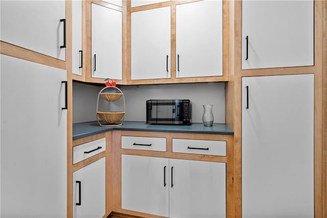 kitchen with white cabinetry