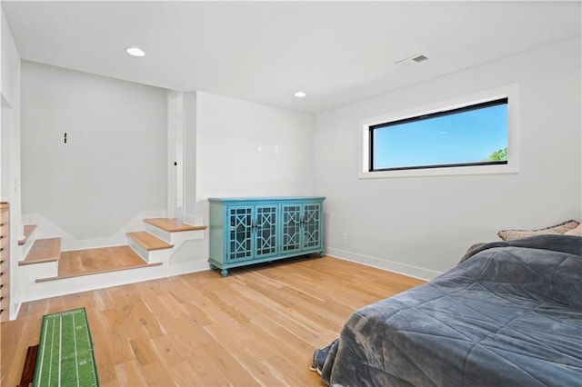 bedroom with hardwood / wood-style flooring