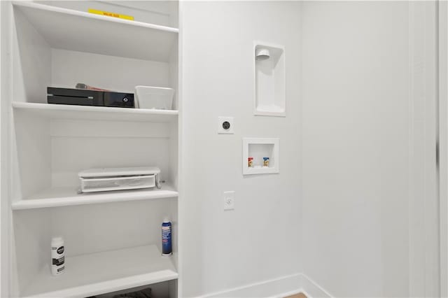 washroom featuring electric dryer hookup and washer hookup