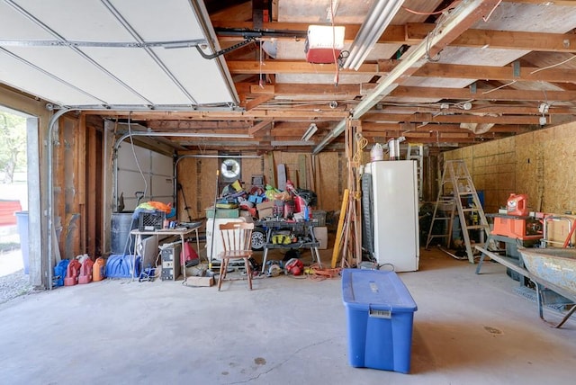 garage featuring white fridge