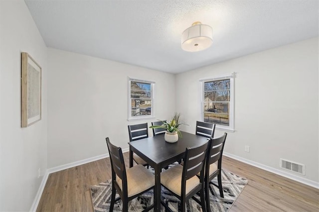 dining room featuring hardwood / wood-style floors