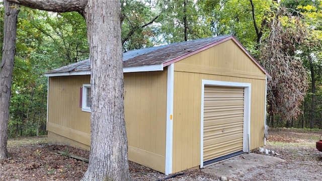 28530 Shore Rd, Warsaw, MO 65355 - view of shed featuring a wooded view