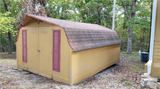 28530 Shore Rd, Warsaw, MO 65355 - view of shed featuring view of wooded area