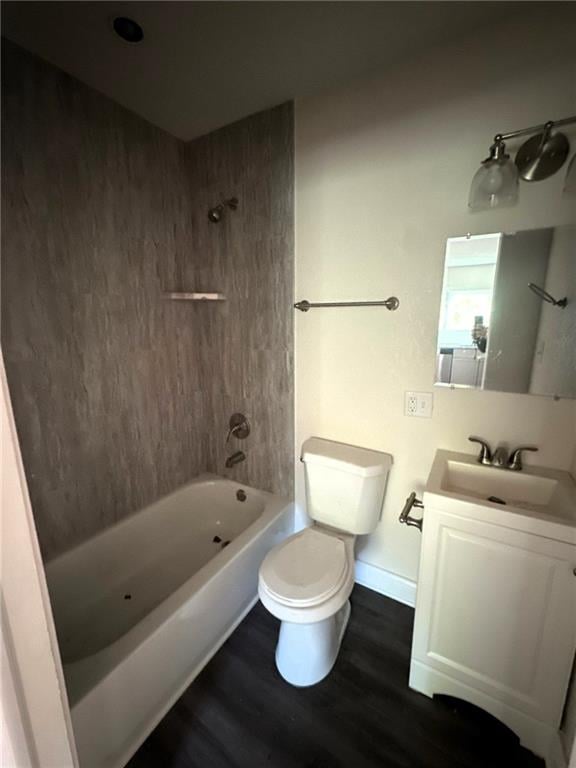 full bathroom featuring hardwood / wood-style flooring, vanity, toilet, and shower / bath combination