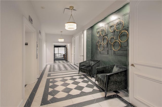 corridor with light tile patterned flooring