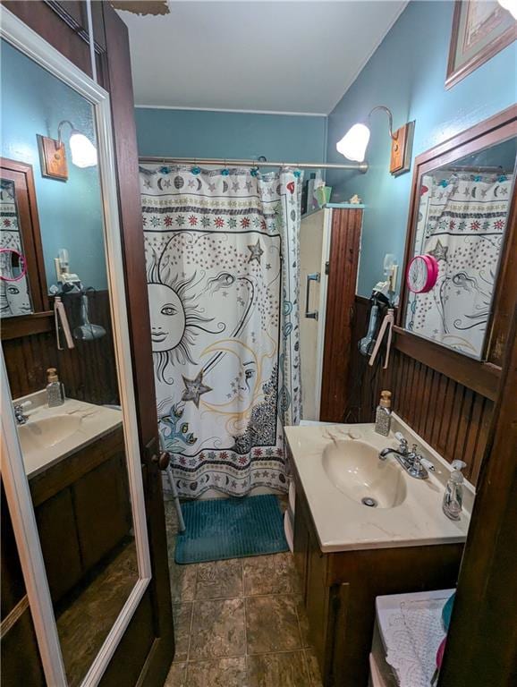 bathroom featuring vanity and walk in shower