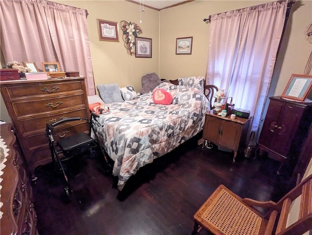 bedroom featuring dark hardwood / wood-style floors