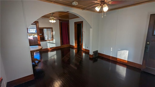 spare room with hardwood / wood-style flooring, ceiling fan, and ornamental molding