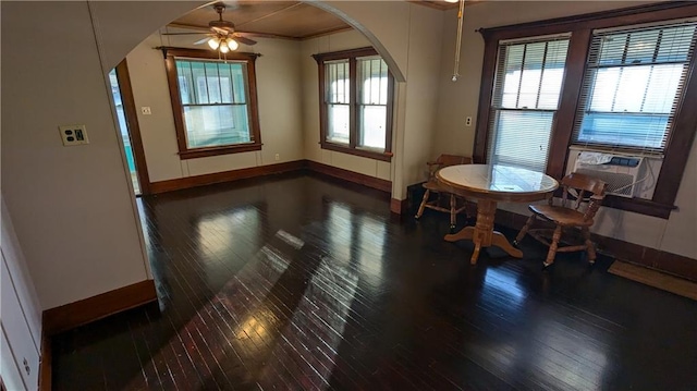 dining room featuring ceiling fan, dark hardwood / wood-style floors, and ornamental molding