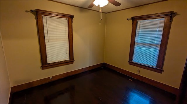 unfurnished room featuring hardwood / wood-style floors and ceiling fan