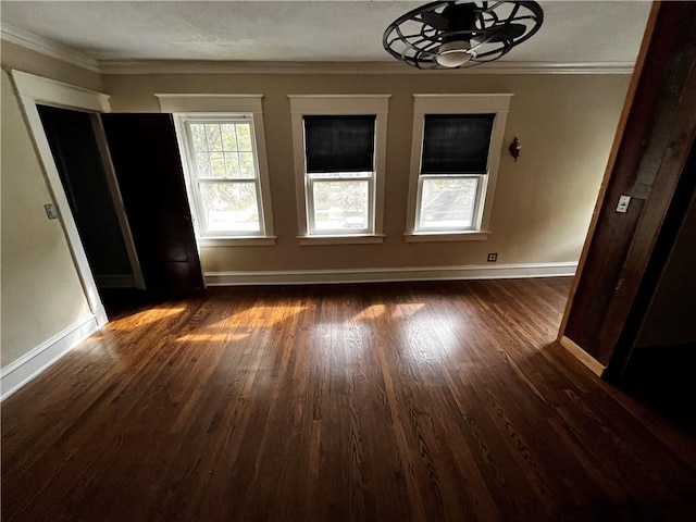 interior space featuring ceiling fan, a textured ceiling, dark hardwood / wood-style floors, and crown molding