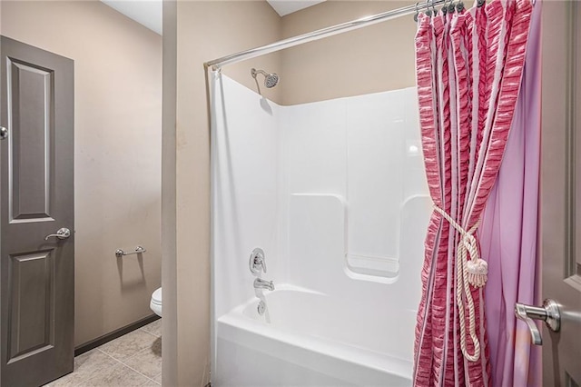 bathroom featuring shower / tub combo, toilet, and tile patterned flooring