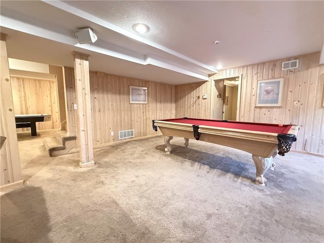 game room with light colored carpet, wooden walls, and pool table