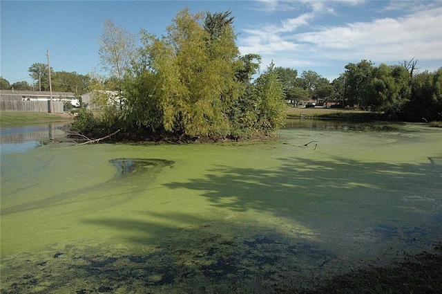 surrounding community with a water view