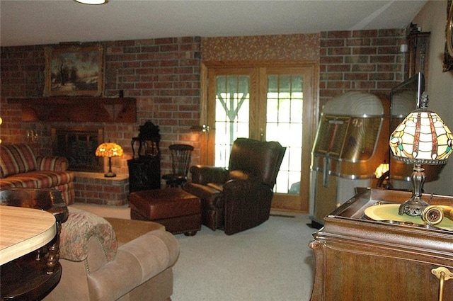 living room featuring french doors, carpet, and a brick fireplace