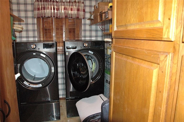 laundry area with separate washer and dryer