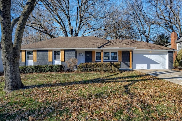 ranch-style home with a garage and a front lawn