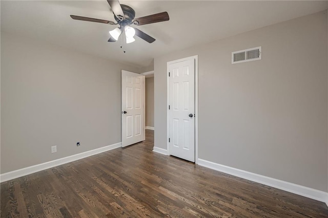 interior space with dark hardwood / wood-style floors and ceiling fan