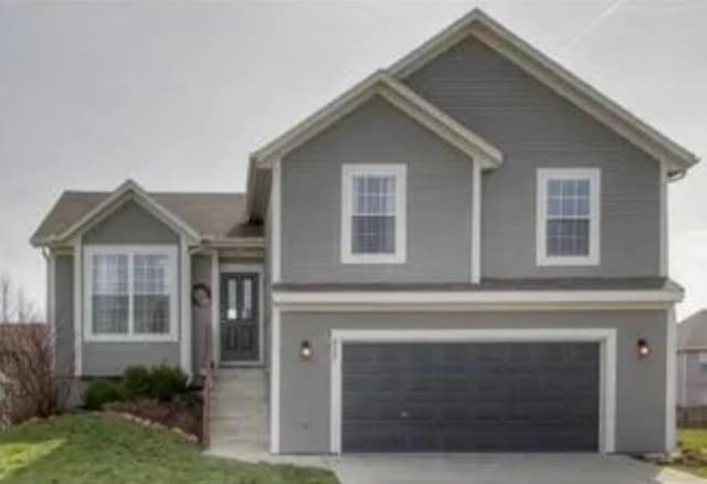 split level home with a garage