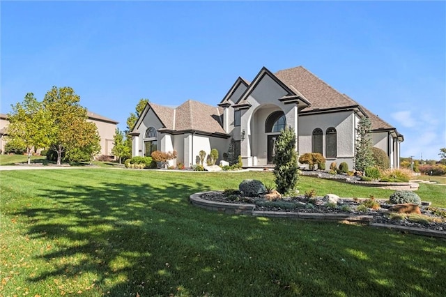 view of front facade with a front yard