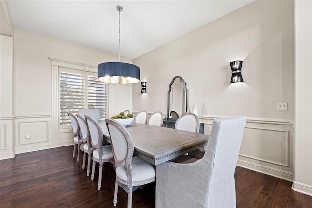 dining space with dark wood-type flooring