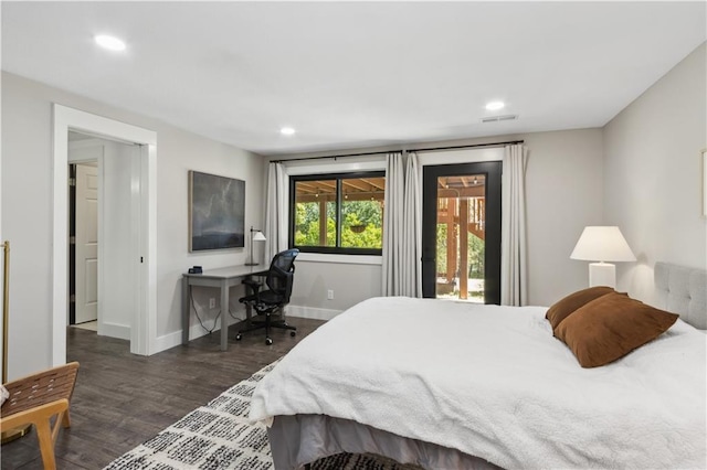 bedroom with dark hardwood / wood-style flooring