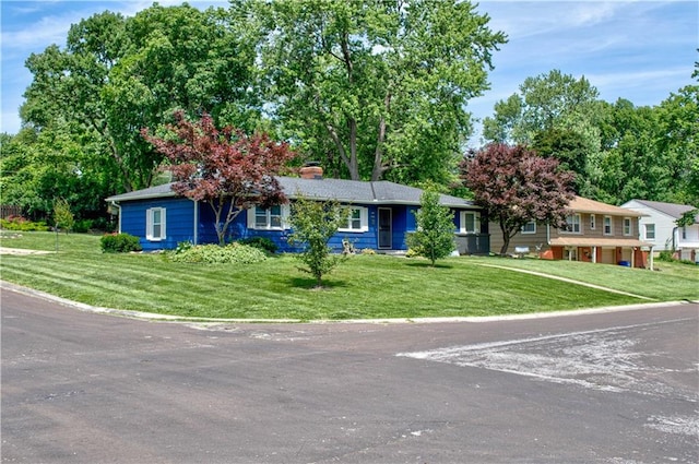 view of front of house featuring a front yard