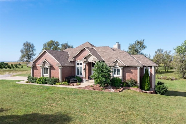 view of front of home with a front yard