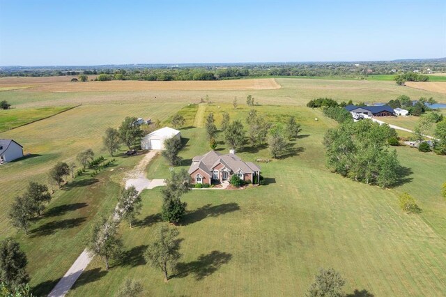 birds eye view of property featuring a rural view