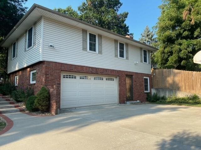 view of front of home with a garage