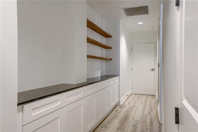 hallway featuring light wood-type flooring