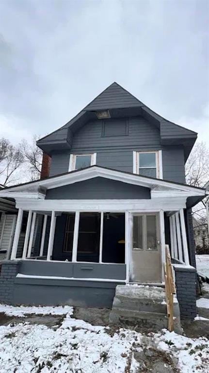 exterior space with a sunroom