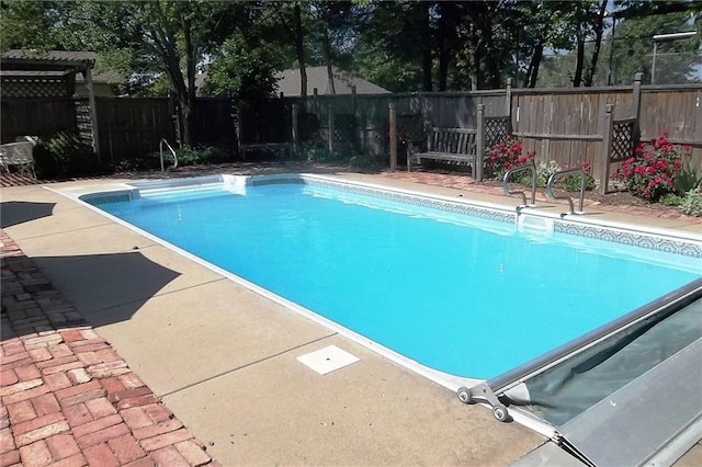 view of pool featuring a fenced backyard