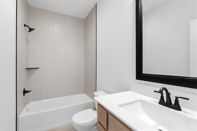 full bathroom with vanity, shower / bath combination, and toilet