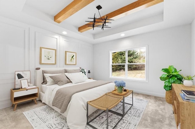 bedroom with a notable chandelier, beam ceiling, light carpet, and a tray ceiling