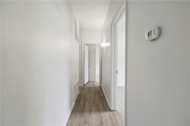 hall featuring light hardwood / wood-style floors