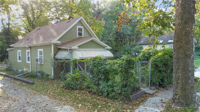 view of property exterior with cooling unit