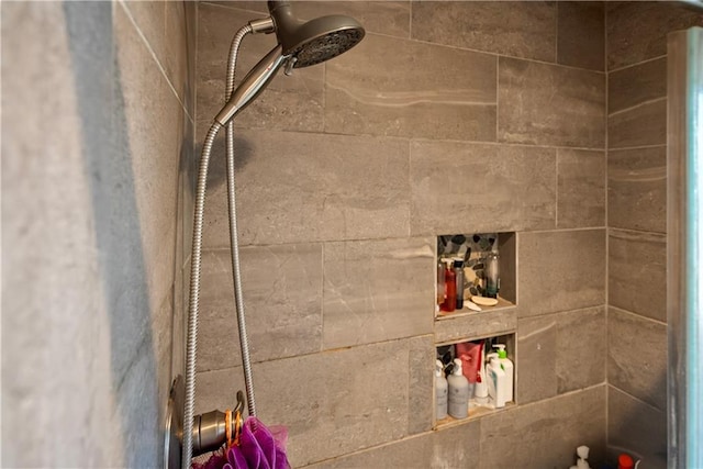 room details with a tile shower