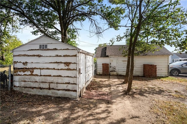 exterior space with an outbuilding