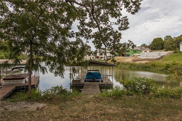 dock area with a water view