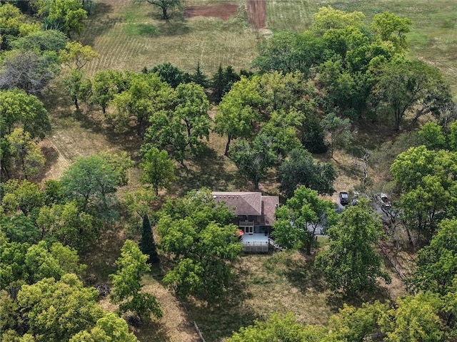 birds eye view of property with a rural view