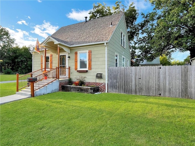 bungalow with a front lawn