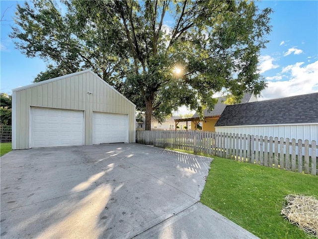 garage with a lawn