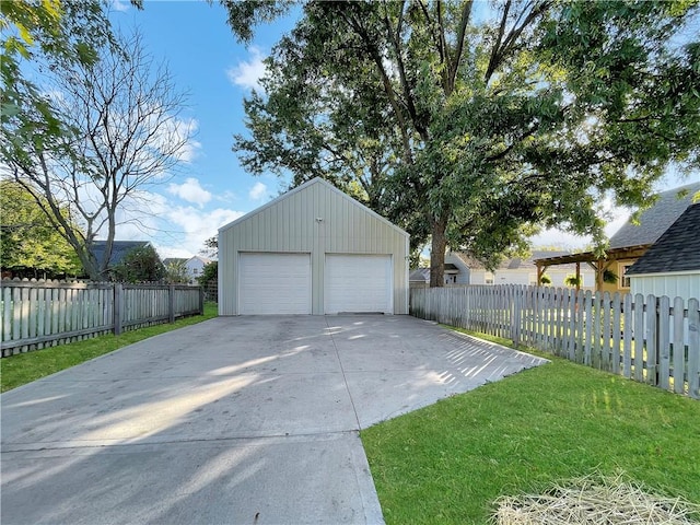 garage featuring a yard