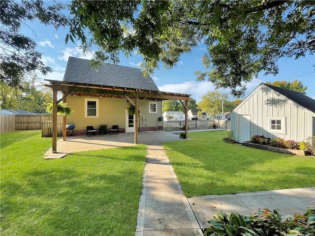 exterior space featuring a lawn and a patio area