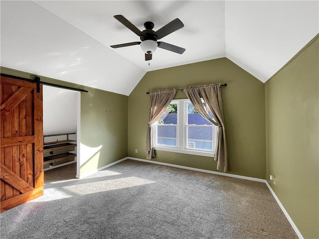 bonus room featuring ceiling fan, vaulted ceiling, and carpet flooring