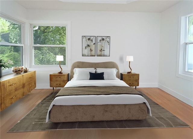 bedroom featuring hardwood / wood-style flooring