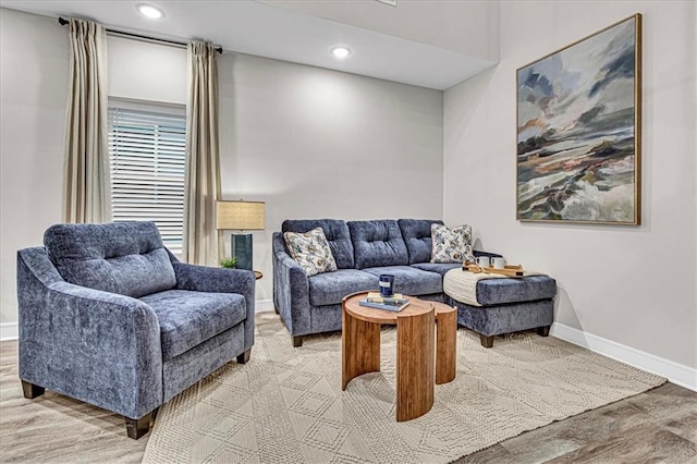 5824 Hunter Ct, Raytown, MO 64133 - living room featuring baseboards, light wood finished floors, and recessed lighting