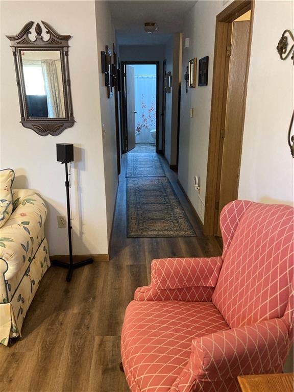 corridor featuring dark hardwood / wood-style flooring