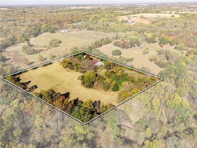 bird's eye view featuring a view of trees